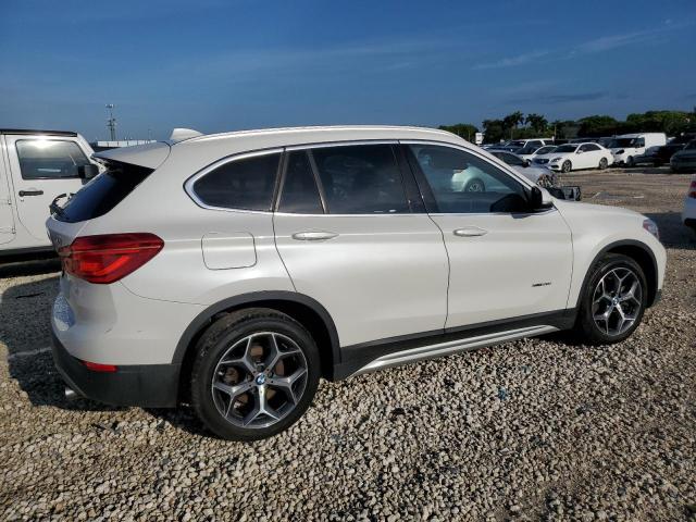 WBXHT3C36GP885570  bmw x1 2015 IMG 2