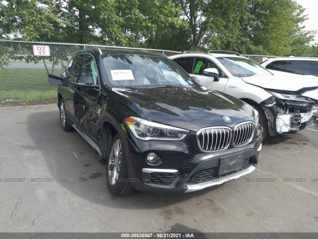 WBXHT3C39GP888365  bmw x1 2015 IMG 0