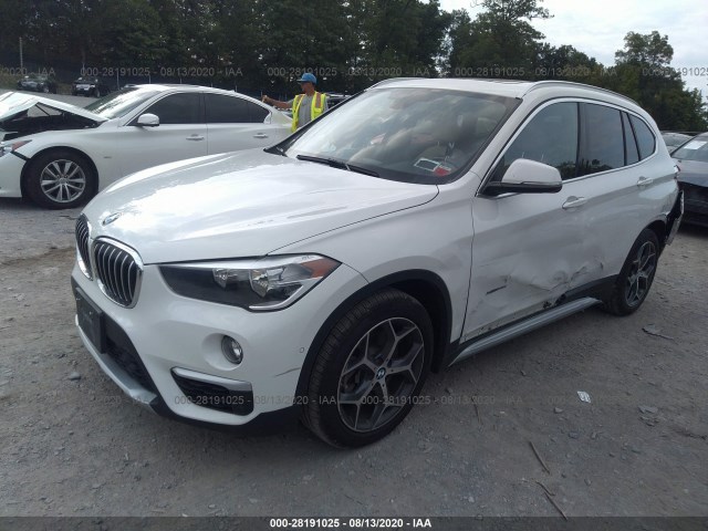 WBXHT3C30G5E54642  bmw x1 2016 IMG 1