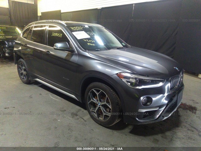 WBXHT3C30GP880901  bmw x1 2016 IMG 0