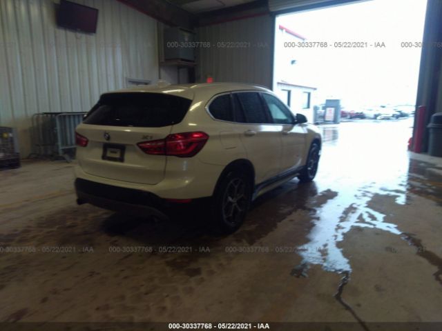 WBXHT3C31GP883077  bmw x1 2016 IMG 3