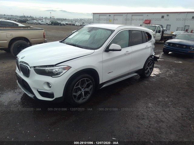 WBXHT3C39G5E52677  bmw x1 2016 IMG 1