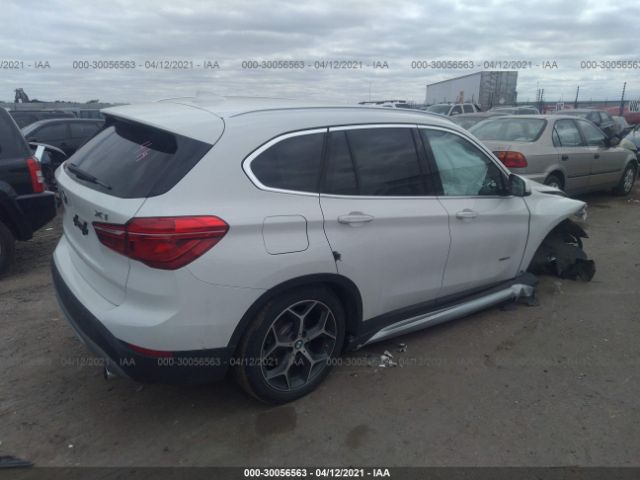 WBXHT3C32J5F93257  bmw x1 2018 IMG 3