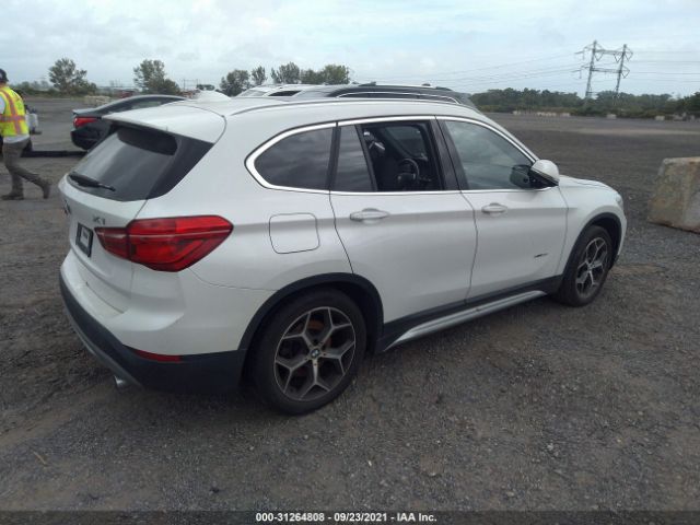 WBXHT3C36J5K27573  bmw x1 2018 IMG 3