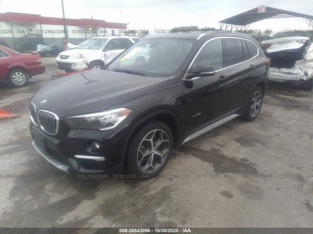 WBXHT3C39J5K31519  bmw x1 2018 IMG 1