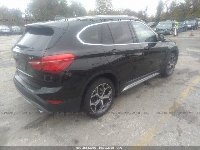 WBXHT3C39J5K31519  bmw x1 2018 IMG 3