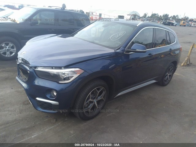 WBXHU7C31J3H42418  bmw x1 2018 IMG 1