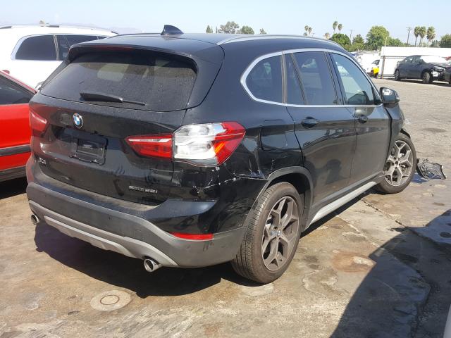 WBXHU7C3XJ5L09066  bmw x1 2018 IMG 3