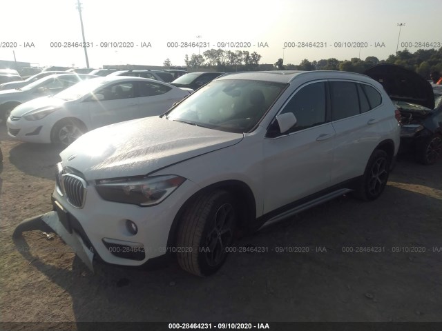 WBXHU7C5XK3H45093  bmw x1 2019 IMG 1