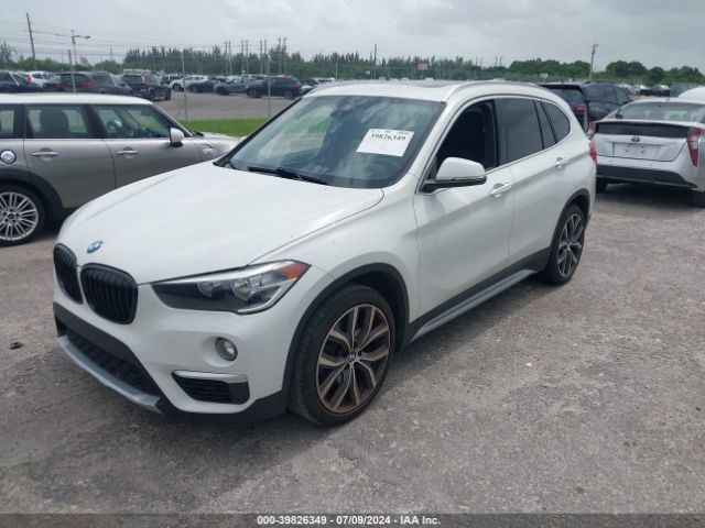 WBXHU7C50K5L11718  bmw x1 2019 IMG 1