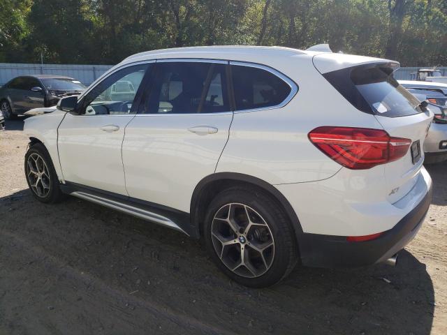 WBXHU7C58K5L12051  bmw x1 2019 IMG 1