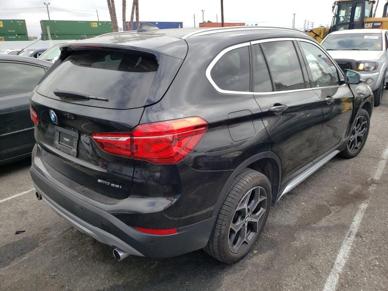 WBXHU7C56K3H46211  bmw x1 sdrive2 2019 IMG 3