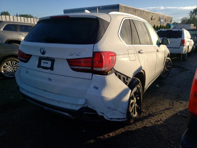 5UXKR0C54J0X84849  bmw x5 xdrive3 2018 IMG 3