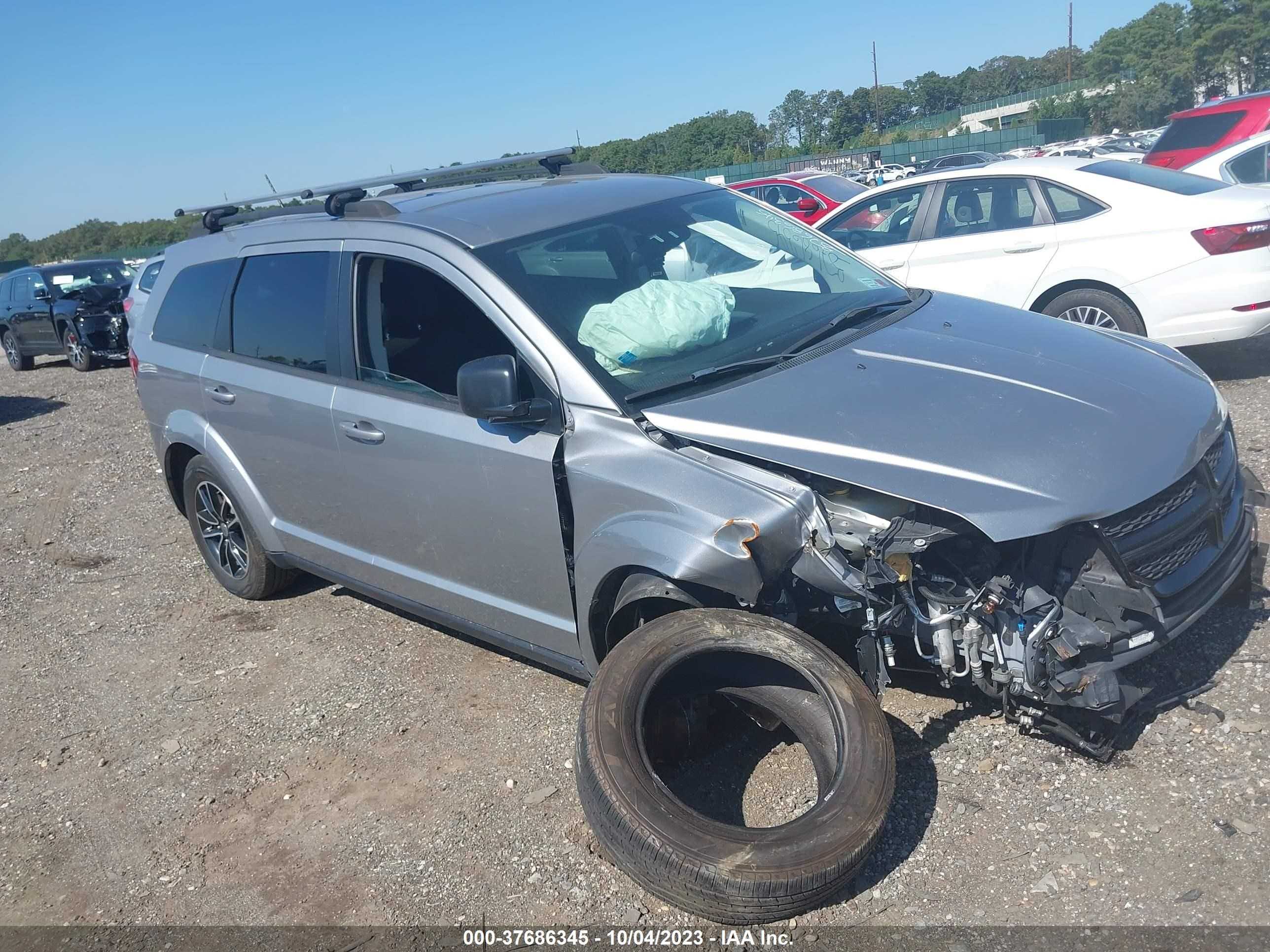 3C4PDCAB7JT229753  dodge journey 2018 IMG 0