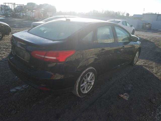 1FADP3F24JL267395  ford focus se 2018 IMG 3