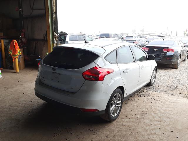 1FADP3K28JL293519  ford focus se 2018 IMG 3