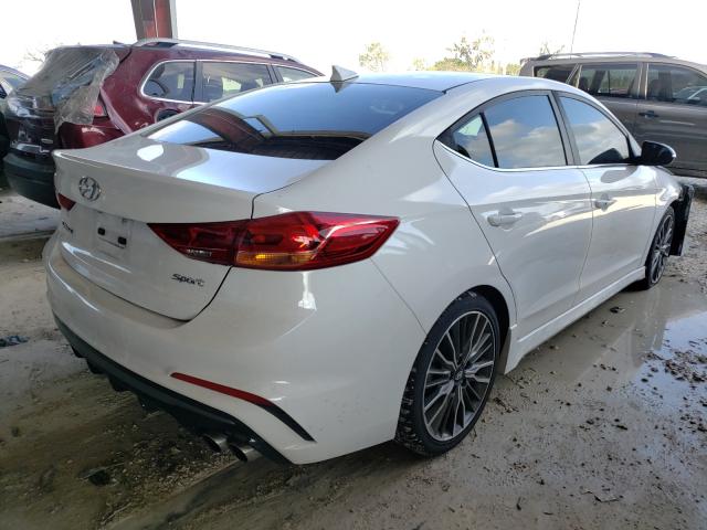 KMHD04LB1JU450865  hyundai  2018 IMG 3