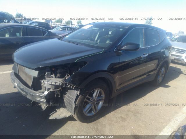 5NMZTDLB1HH018098  hyundai santa fe 2016 IMG 1