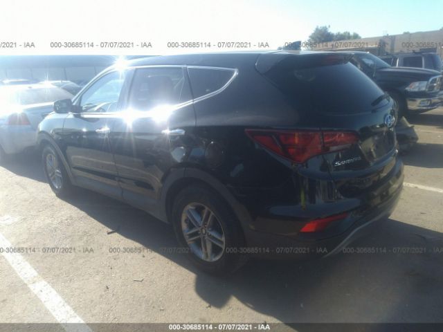 5NMZTDLB1HH018098  hyundai santa fe 2016 IMG 2