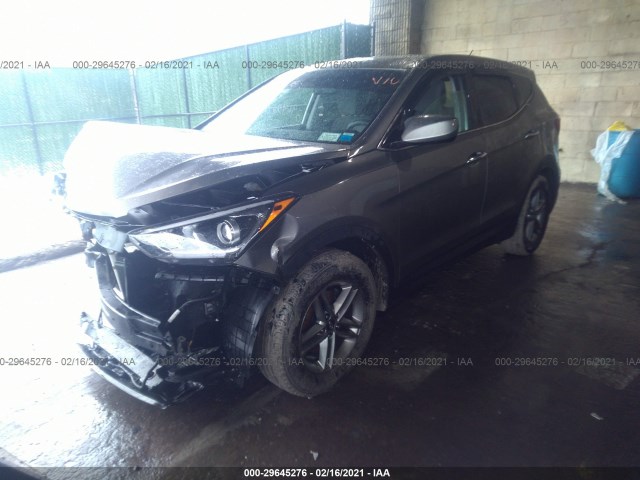 5NMZTDLB6JH099041  hyundai santa fe 2018 IMG 1