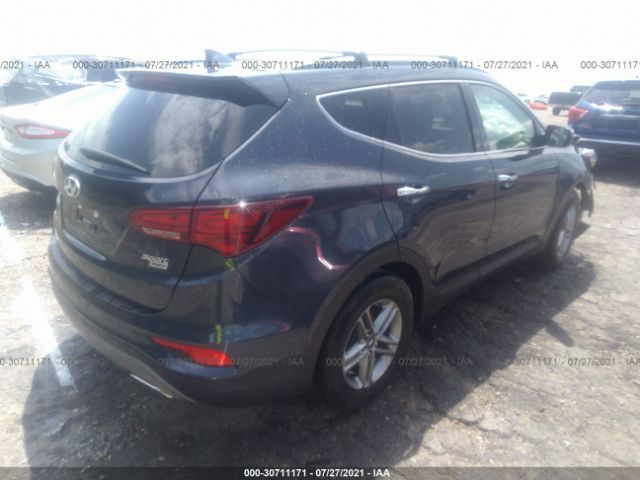 5NMZUDLB6JH103165  hyundai santa fe 2018 IMG 3