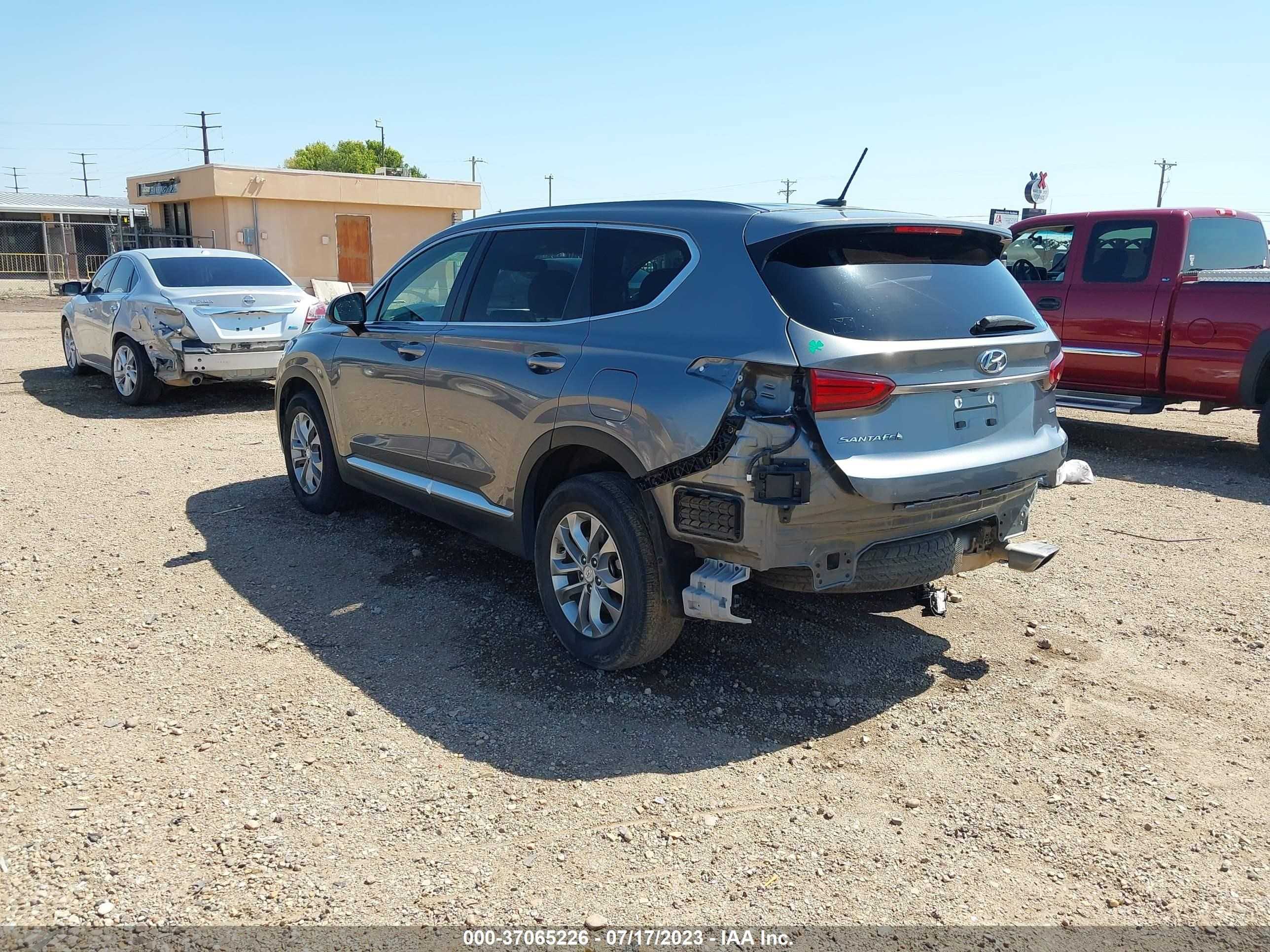 5NMS2CAD8KH120489  hyundai santa fe 2019 IMG 2