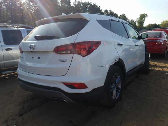 5NMZUDLB3JH097180  hyundai santa fe s 2018 IMG 3