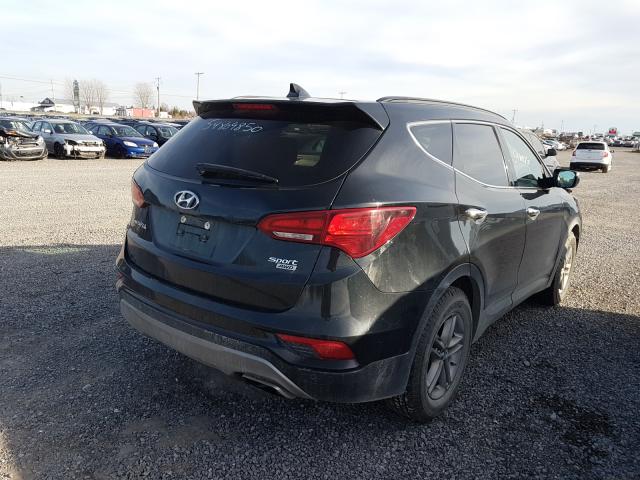 5NMZUDLB6JH068157  hyundai santa fe s 2018 IMG 3