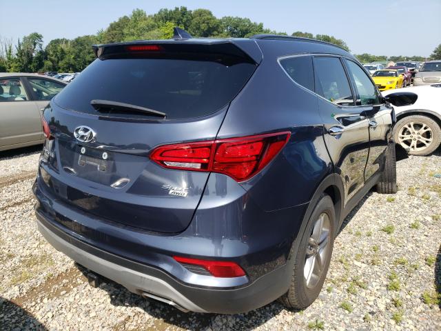 5NMZUDLB6JH104414  hyundai santa fe s 2018 IMG 3