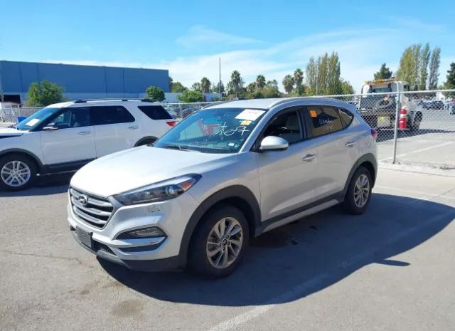 KM8J33A4XJU721432  hyundai tucson 2018 IMG 1