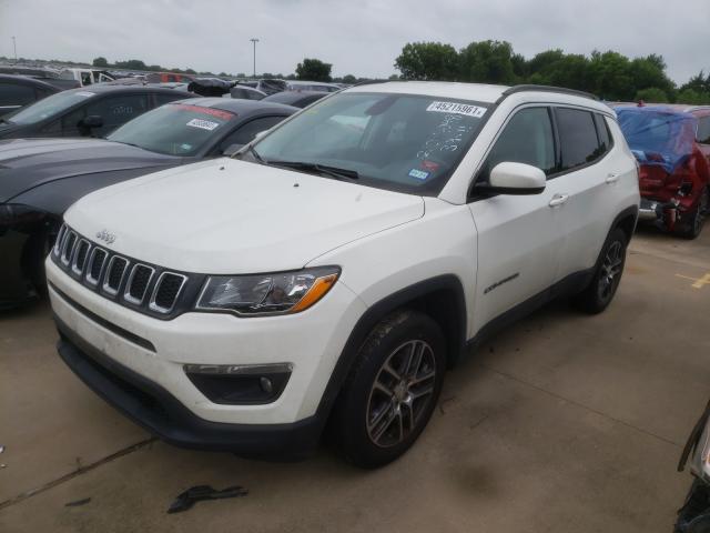 3C4NJCBB2JT165569  jeep  2018 IMG 1