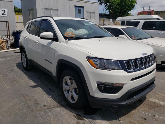 3C4NJCBB3JT338807  jeep  2018 IMG 0