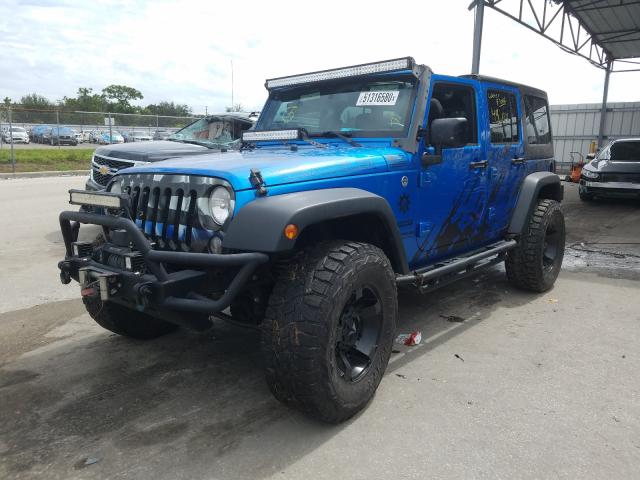 1C4BJWDG8FL504884  jeep wrangler u 2015 IMG 1