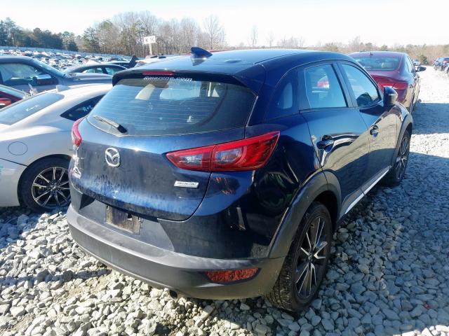 JM1DKBD76G0126310  mazda  2016 IMG 3