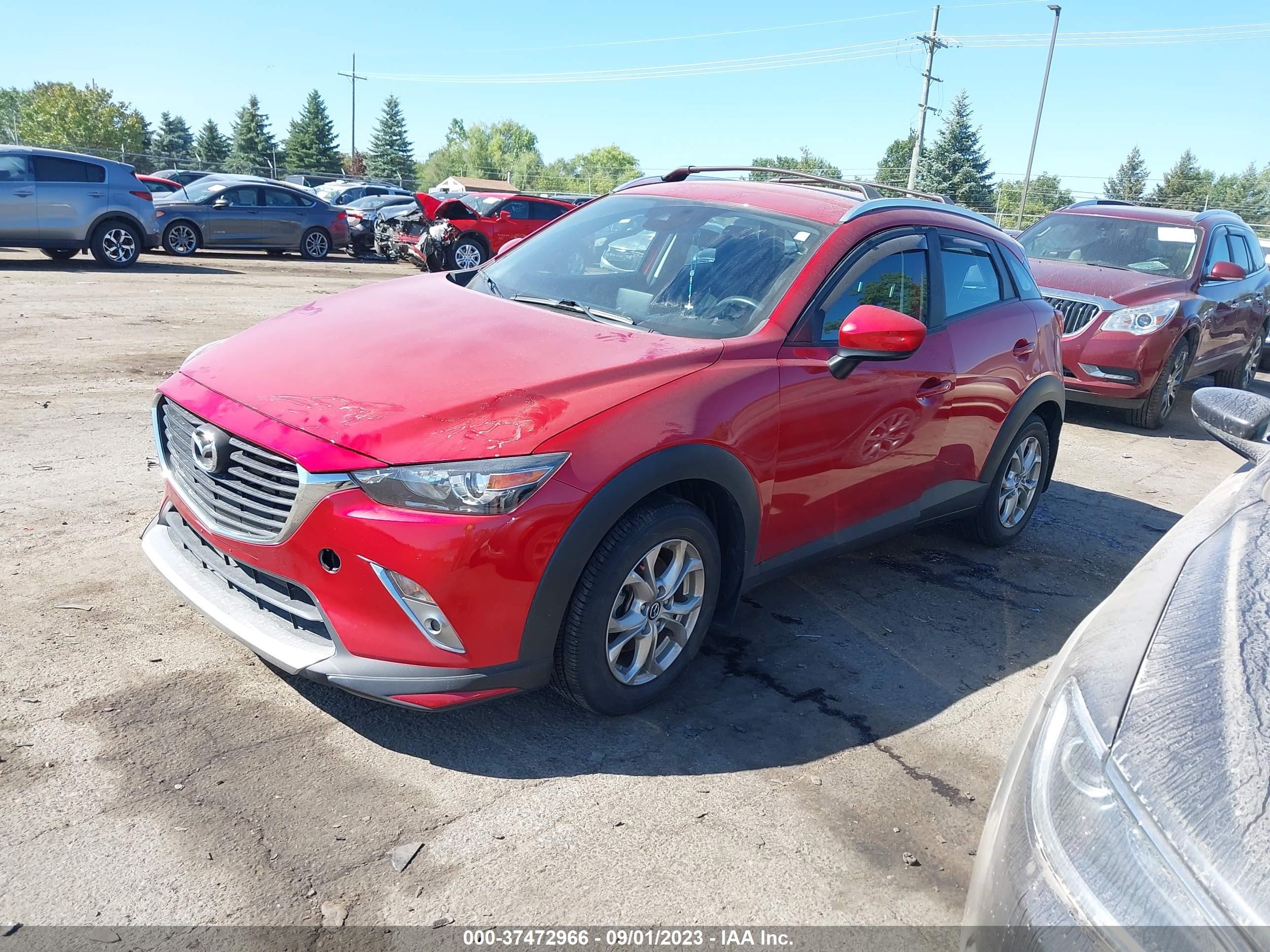 JM1DKFB77J1305449  mazda cx-3 2018 IMG 1