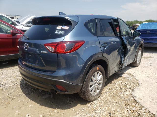 JM3KE2CY9G0731017  mazda  2016 IMG 3