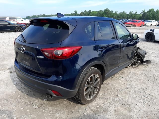 JM3KE2DY0G0629491  mazda  2016 IMG 3