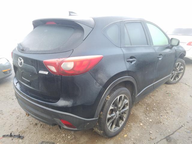 JM3KE4DY1G0644335  mazda  2016 IMG 3