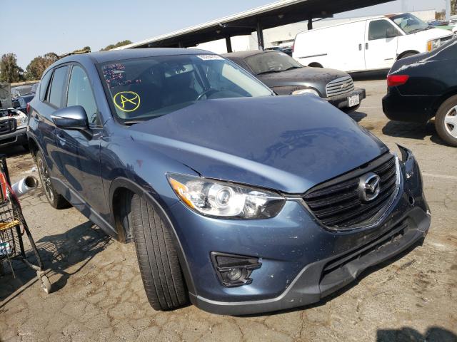 JM3KE4DY7G0685603  mazda  2016 IMG 0