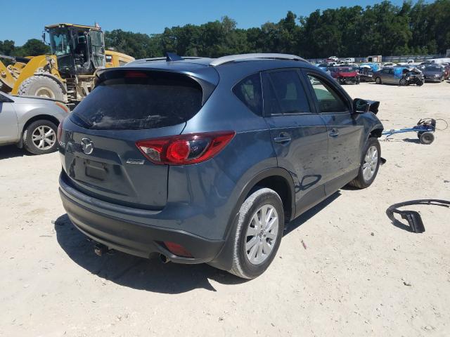 JM3KE2CY5G0872733  mazda  2016 IMG 3