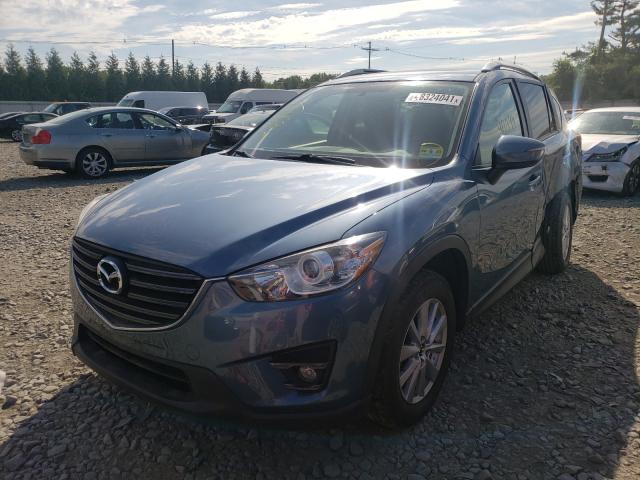 JM3KE4CY8G0762187  mazda  2016 IMG 1