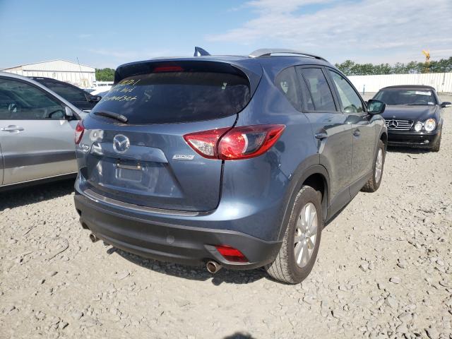 JM3KE4CY8G0762187  mazda  2016 IMG 3