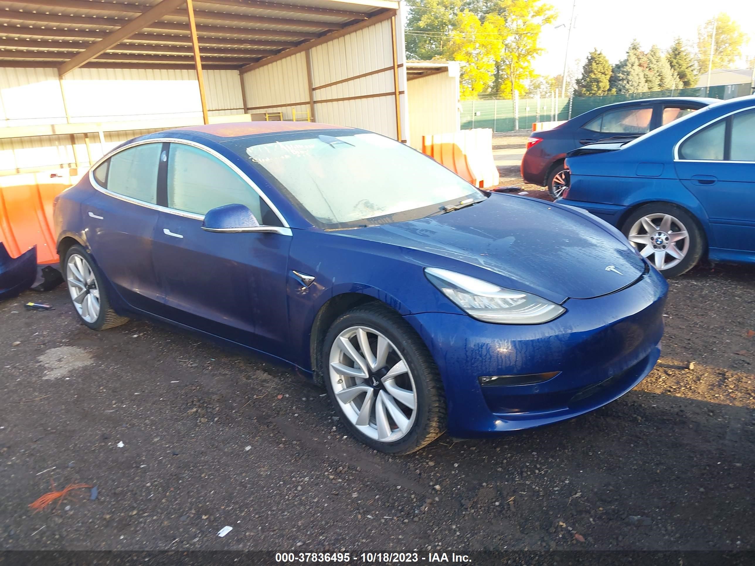 5YJ3E1EA3JF004701  tesla model 3 2018 IMG 0