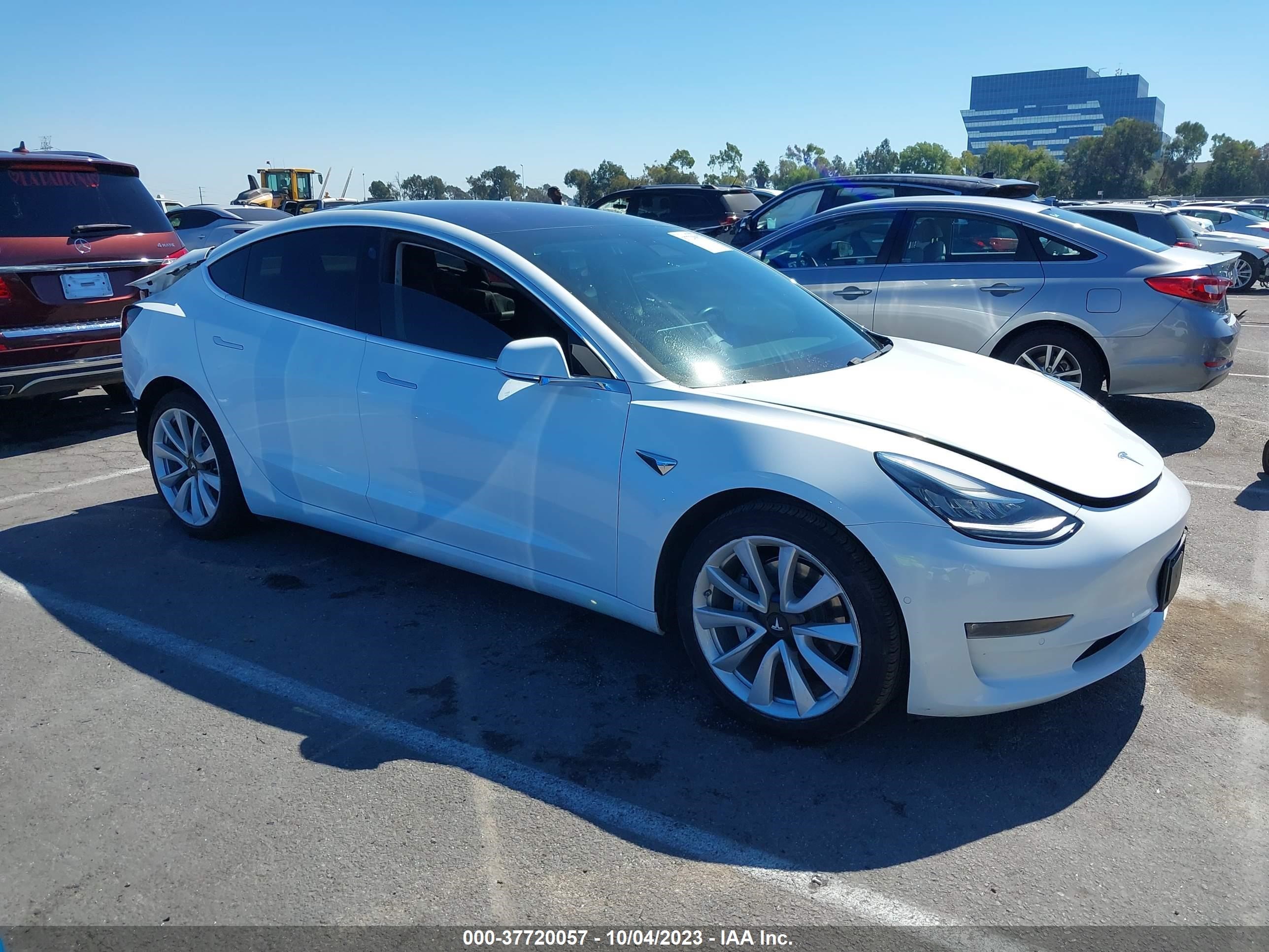 5YJ3E1EA7JF053657  tesla model 3 2018 IMG 0