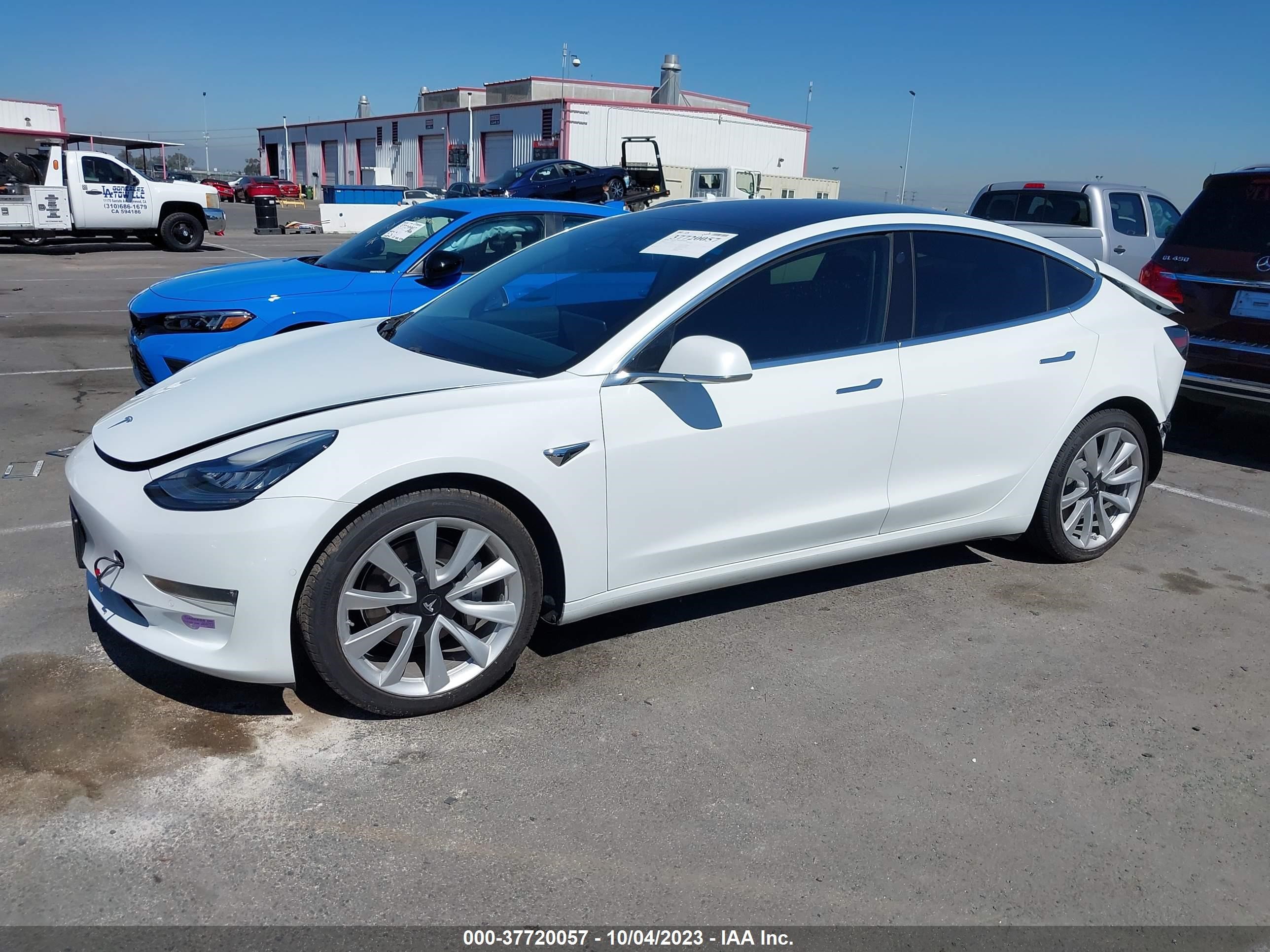 5YJ3E1EA7JF053657  tesla model 3 2018 IMG 1