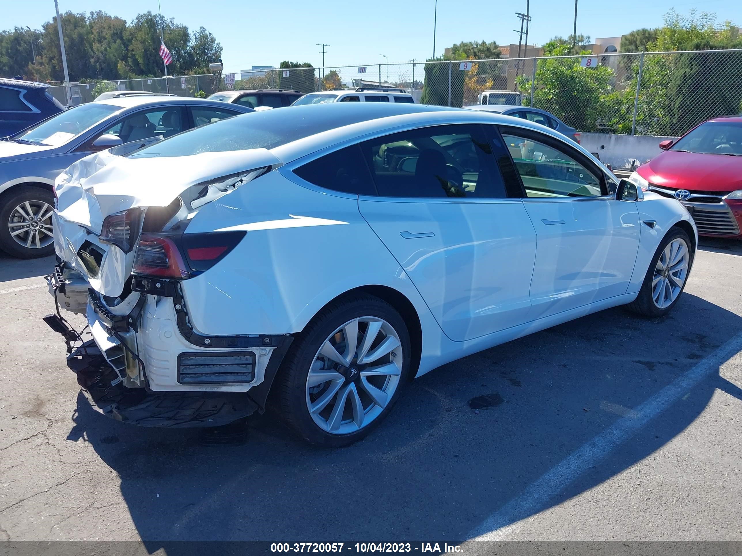 5YJ3E1EA7JF053657  tesla model 3 2018 IMG 3