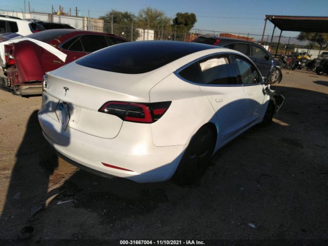 5YJ3E1EA7JF168713  tesla model 3 2018 IMG 3