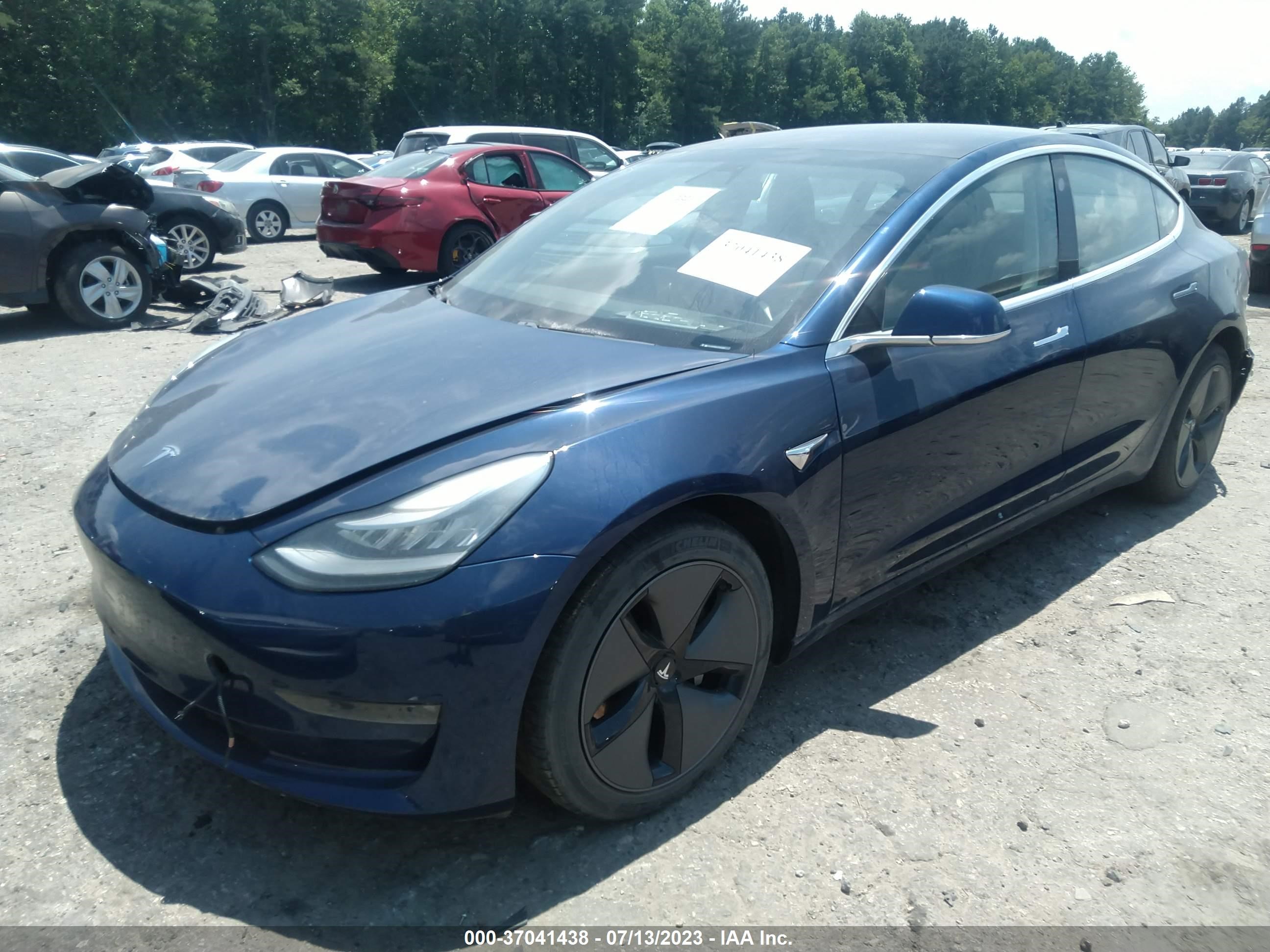 5YJ3E1EB1JF105387  tesla model 3 2018 IMG 1