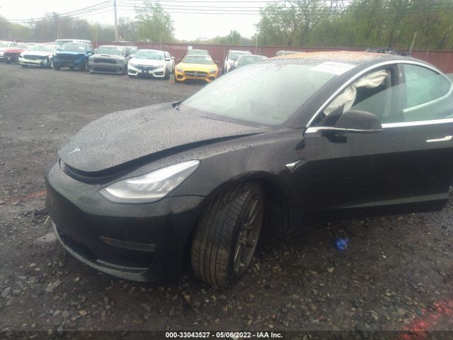 5YJ3E1EB4JF144197  tesla model 3 2018 IMG 1