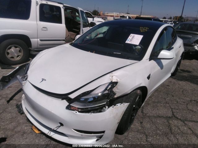 5YJ3E1EA2MF874217  tesla model 3 2021 IMG 1